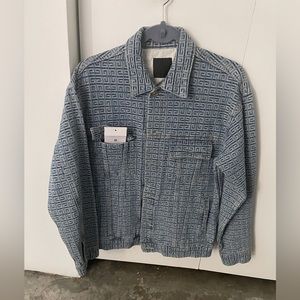 Denim jacket authenticity unknown.